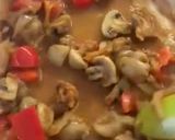 A picture of step 10 of Pork Medallions in a Mushroom and Sherry creamy sauce.