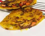 A picture of step 6 of Malabar paratha chicken sandwich.