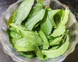 A picture of step 2 of Gondhoraj Lemon mint juice.