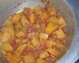 A picture of step 9 of Masala Fried Curried Potatoes.