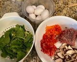 A picture of step 1 of Omelet with Mushrooms, Bell Pepper, and Spinach.