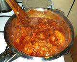 A picture of step 1 of Spicy chicken in a pan.