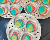 A picture of step 8 of Designer Colourful idli.
