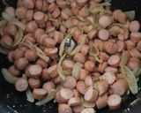 Une image de l'étape 1 de Coquillettes crémeuses aux saucisses de Strasbourg au Cookeo infinity.