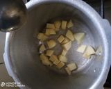 A picture of step 1 of -potato and chickpea roast.