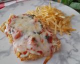 Foto del paso 3 de la receta: Milanesa de ternera a la napolitana