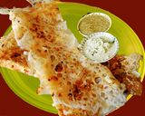 A picture of step 6 of Onion rava maida dosa.