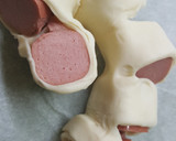 Foto del paso 5 de la receta: Bollo de hojaldre con frankfurt y queso