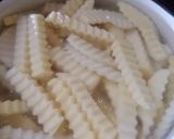 صورة لخطوة 2 من وصفة بطاطا مقرمشة في الفرن🍟