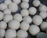 A picture of step 3 of Garlic rice balls and baked beans.