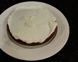 A picture of step 15 of Mocha Layer Cake with Whipped Mascarpone Cream and a Coffee Glaze Drizzle.
