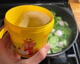 A picture of step 2 of Just in 15 mins! Chinese style fish ball, bok choy and egg soup.