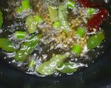 A picture of step 2 of Lemon rice elumichai sadam.