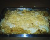 A picture of step 4 of Cheesy Fish Finger and chips bake.