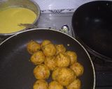 A picture of step 3 of Aloo (potato) bada with curry.
