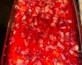A picture of step 9 of Strawberry jello poke cake.