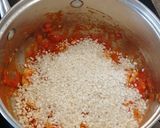 Foto del paso 7 de la receta: Arroz caldoso con sepia, almejas y gambones