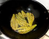 A picture of step 6 of Fry bitter grud (karaly) with peels.