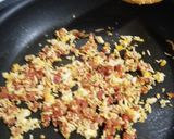 Foto del paso 3 de la receta: Guisantes salteados con jamón y huevo