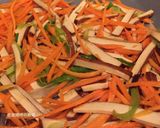A picture of step 8 of Stir-Fried Mixed Vegetables with Egg Crepe and Curry Sauce.