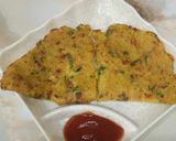 A picture of step 4 of 20 min breakfast vegetable besan cheela.