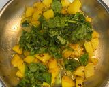 A picture of step 4 of Braised Potatoes with Spinach.