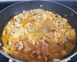 Foto del paso 4 de la receta: Calabacines rellenos con salsa semi boloñesa de pavo picado
