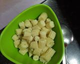 A picture of step 1 of Veg. Babycorn in curd.