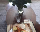 A picture of step 6 of Coconut crumbed tilapia with a mixed salad and ugali.