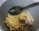 A picture of step 4 of Burnt chilli garlic rice with baked beans gravy.