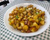 Une image de l'étape 11 de Pommes de terre sautées aux oignons nouveaux.