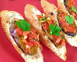 A picture of step 5 of French garlic toast with tomato salad.