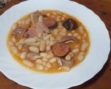 A picture of step 6 of Fabada with Chorizo, Blood Sausage, and Pork Ear in a Pressure Cooker.