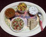 A picture of step 8 of Methi, mutter & carrots pulav (in proper lunch thali).