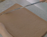 A picture of step 10 of Cocoa Swiss Roll with Chocolate Cream.