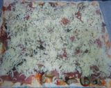 Foto del paso 4 de la receta Pizza con setas shiitake, cebolla y jamón