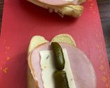 A picture of step 2 of Hotdogs bun sandwiches.