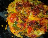 A picture of step 12 of Indian pizza.