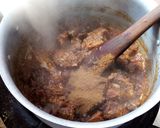 A picture of step 8 of Beef pilau.