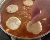Foto del paso 15 de la receta: Cazuela de merluza y langostinos con su caldo
