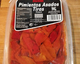 Foto del paso 2 de la receta: Tosta de pimientos asados, hierbabuena y huevo poche