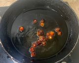 A picture of step 11 of Sweet and sour Tomato Curry serve with white rice.