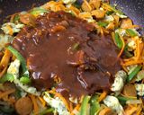 A picture of step 14 of Schezwan Egg Sausage Noodles.