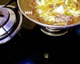 A picture of step 1 of Mushrooms and Soya Biryani with veggies.