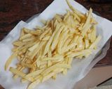 Foto del paso 13 de la receta: Palomitas de cerdo adobado en salsa de almendras y papas fritas