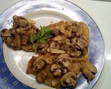 Foto del passaggio 20 della ricetta Scaloppine di lonza di maiale con i funghi al forno