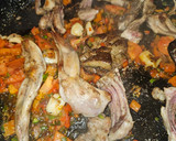 Foto del paso 3 de la receta: Arroz con conejo, sepia, langostinos, calabacín y espinacas