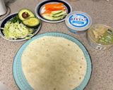 A picture of step 1 of Hummus and Avocado Wrap 🥑 🌯.