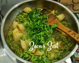 A picture of step 2 of Cowpea Beans Hari Pyaaz and Aloo Methi.