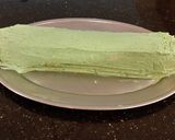 A picture of step 25 of Chocolate Cake Roll with Pistachio Cream Filling and Frosting.